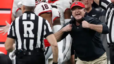 Georgia coach Kirby Smart argues a call with the ref during the second half of the SEC Championship game against Alabama at Mercedes-Benz Stadium in Atlanta