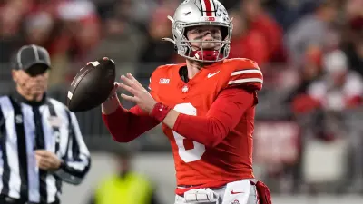 Ohio State quarterback Kyle McCord looks to pass during a game against Minnesota at Ohio Stadium in Columbus