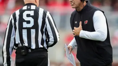 Wisconsin head coach Luke Fickell argues with an official after a penalty during a game against Iowa on Saturday