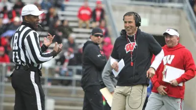Wisconsin head coach Luke Fickell chats with an official during The Launch