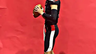 Mike Farrell Sports 2025 2-Star QB Max Gerlich from Anderson (TX) takes a picture during a visit to Texas Tech University