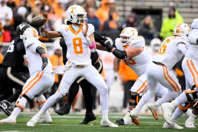 Nov 30, 2024; Nashville, Tennessee, USA; Tennessee Volunteers quarterback Nico Iamaleava (8) passes the ball against the Vanderbilt Commodores during the first half at FirstBank Stadium.