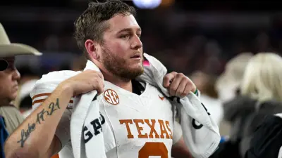 Texas Longhorns quarterback Quinn Ewers (3) looks into the crowd after the 28-14 loss to Ohio State in the College Football Playoff semifinal game in the Cotton Bowl at AT&T Stadium on Friday