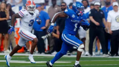 Kentucky's Ray Davis ran past Florida's Jason Marshall Jr. for the long touchdown Saturday afternoon. Sept. 30