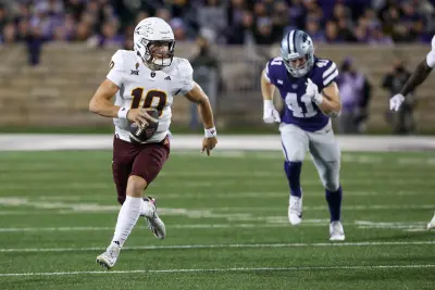 Nov 16, 2024; Manhattan, Kansas, USA; Arizona State Sun Devils quarterback Sam Leavitt (10) runs away from Kansas State Wildcats linebacker Austin Moore (41) dureing the first quarter at Bill Snyder Family Football Stadium.