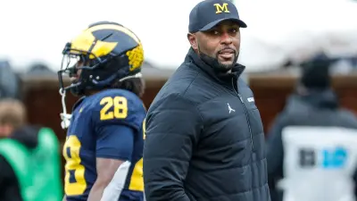 Michigan head coach Sherrone Moore watches a play during the second half of the spring game at Michigan Stadium in Ann Arbor on Saturday