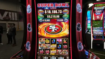 Slot machines line the back wall of CJ s Public House on Nov. 22