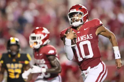 Aug 29, 2024; Little Rock, Arkansas, USA; Arkansas Razorbacks quarterback Taylen Green (10) rushes for a touchdown in the second quarter against the Pine Bluff Golden Lions at War Memorial Stadium