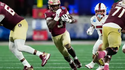 Florida State Seminoles running back Trey Benson (3) makes his way down the field for a touchdown. The Florida State Seminoles defeated the Virginia Tech Hokies 39-17 at Doak Campbell Stadium on Saturday