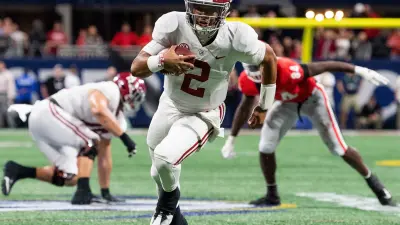 Alabama quarterback Jalen Hurts (2) carries for the go ahead touchdown against Georgia in the SEC Championship Game at Mercedes Benz Stadium in Atlanta