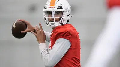 Tennessee quarterback Nico Iamaleava (8) throws a pass during Tennessee football practice at Haslam Field in Knoxville
