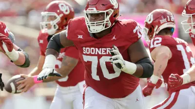 Oklahoma's Cayden Green (70) prepares to block in the first half of the college football game between the University of Oklahoma Sooners and the University of Central Florida Knights at Gaylord Family Oklahoma-Memorial Stadium in Norman