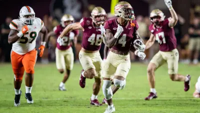 Florida State Seminoles wide receiver Keon Coleman (4) sprints down the field towards the end zone. The Florida State Seminoles defeated the Miami Hurricanes 27-20 on Saturday