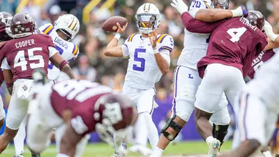 LSU quarterback Jayden Daniels looks to throw during his team's game against Texas A&M in Tiger Stadium in Baton Rouge