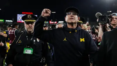 Michigan head coach Jim Harbaugh waves at fans to celebrate a 27-20 Rose Bowl win over Alabama at the 2024 Rose Bowl in Pasadena
