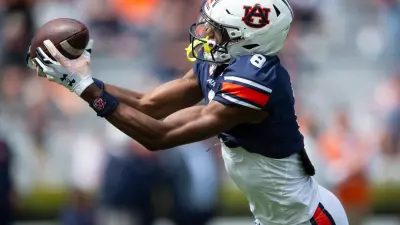 Auburn Tigers wide receiver Cam Coleman (8) catches a deep pass over the middle during the A-Day spring game at Jordan-Hare Stadium in Auburn