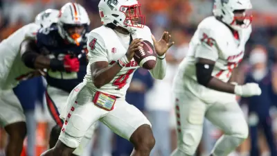 New Mexico Lobos quarterback Devon Dampier (4) looks to throw the ball as Auburn Tigers take on New Mexico Lobos at Jordan-Hare Stadium in Auburn