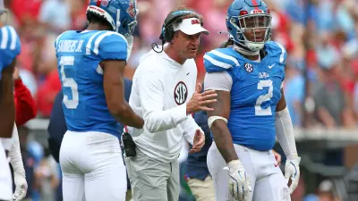 Mississippi Rebels head coach Lane Kiffin gives direction during the second half against the Kentucky Wildcats at Vaught-Hemingway Stadium.