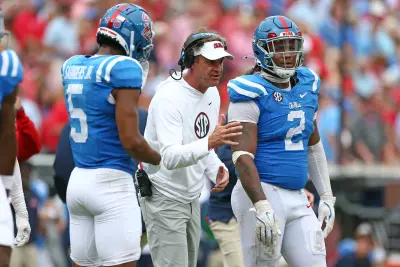 Mississippi Rebels head coach Lane Kiffin gives direction during the second half against the Kentucky Wildcats at Vaught-Hemingway Stadium.