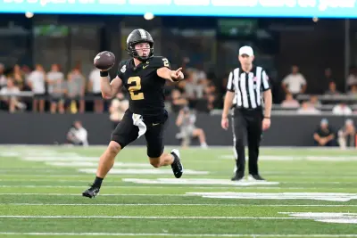 Oct 5, 2024; Nashville, Tennessee, USA; Vanderbilt Commodores quarterback Diego Pavia (2) scrambles against the Alabama Crimson Tide during the second half at FirstBank Stadium.