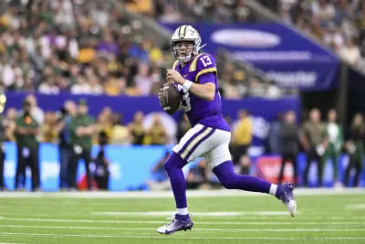 Dec 31, 2024; Houston, TX, USA; LSU Tigers quarterback Garrett Nussmeier (13) runs the ball during the first half against the Baylor Bears at NRG Stadium.