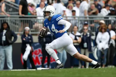 Apr 26, 2025; University Park, PA, USA; Penn State Nittany Lions quarterback Jaxon Smolik (14) runs with the ball during the first quarter of the Blue White spring game at Beaver Stadium. The White team defeated the Blue team 10-8. Mandatory Credit: Matthew O'Haren-Imagn Images