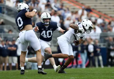 Apr 26, 2025; University Park, PA, USA; Penn State Nittany Lions running back Corey Smith (24) makes a catch during the first quarter of the Blue White spring game at Beaver Stadium. The White team defeated the Blue team 10-8. Mandatory Credit: Matthew O'Haren-Imagn Images