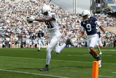 Apr 26, 2025; University Park, PA, USA; Penn State Nittany Lions wide receiver Lyrick Samuel (81) runs the ball into the end zone for a touchdown during the second quarter of the Blue White spring game at Beaver Stadium. The White team defeated the Blue team 10-8. Mandatory Credit: Matthew O'Haren-Imagn Images