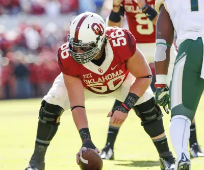 Nov 8, 2014; Norman, OK, USA; Oklahoma Sooners center Ty Darlington (56) during the game against the Baylor Bears at Gaylord Family - Oklahoma Memorial Stadium.