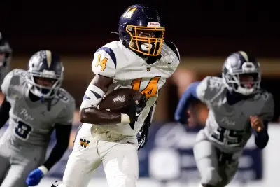 Webb’s Joel Wyatt (14) runs the ball against Pope John Paul II during the second half at Pope Saint John Paul II Preparatory School in Hendersonville, Tenn., Friday, Sept. 13, 2024. © Andrew Nelles / The Tennessean / USA TODAY NETWORK via Imagn Images