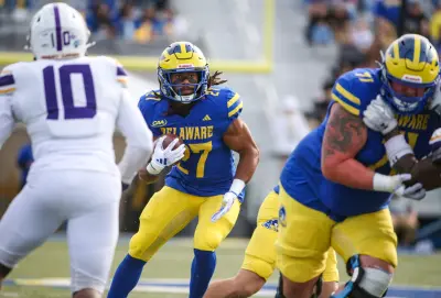 Delaware running back Jo'Nathan Silver takes the ball on a run in the first quarter of the Blue Hens' 28-14 win against Albany at Delaware Stadium, Saturday, Oct. 26, 2024 © William Bretzger/Delaware News Journal / USA TODAY NETWORK via Imagn Images